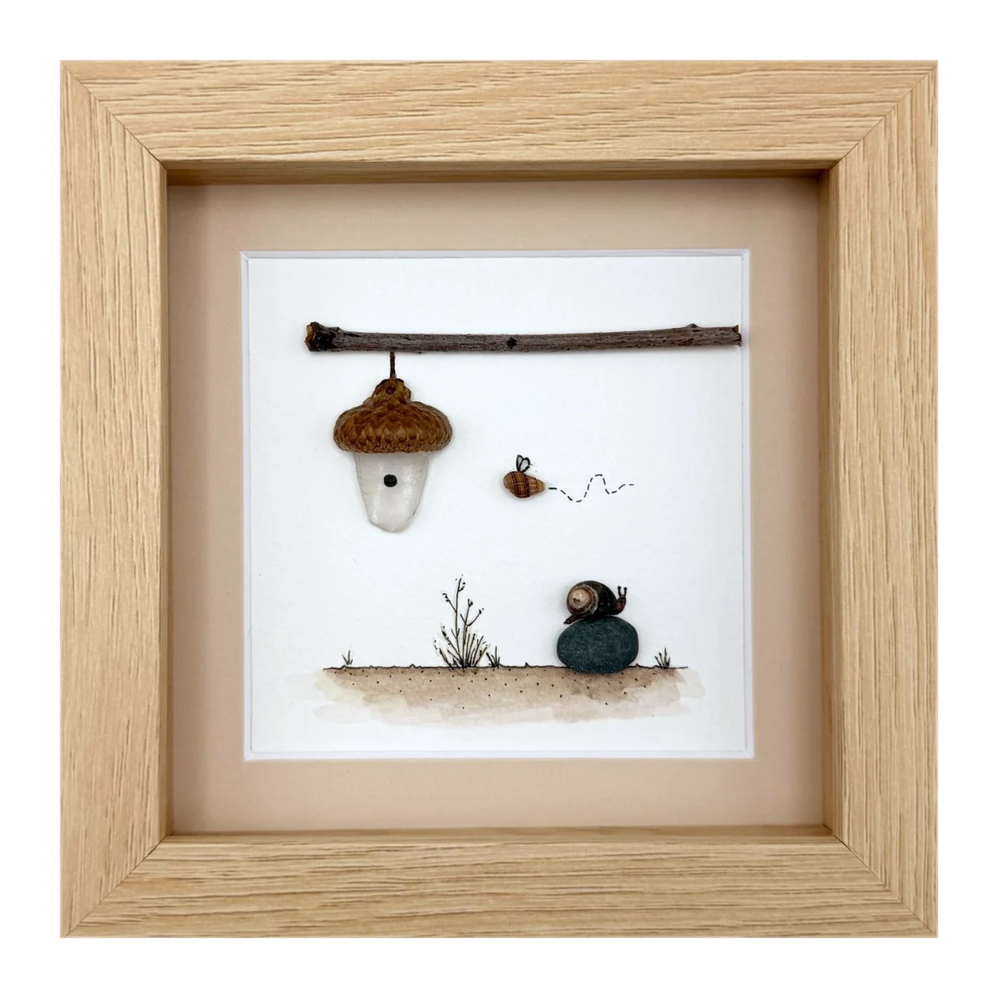 Hanging acorn house with a bee and snail