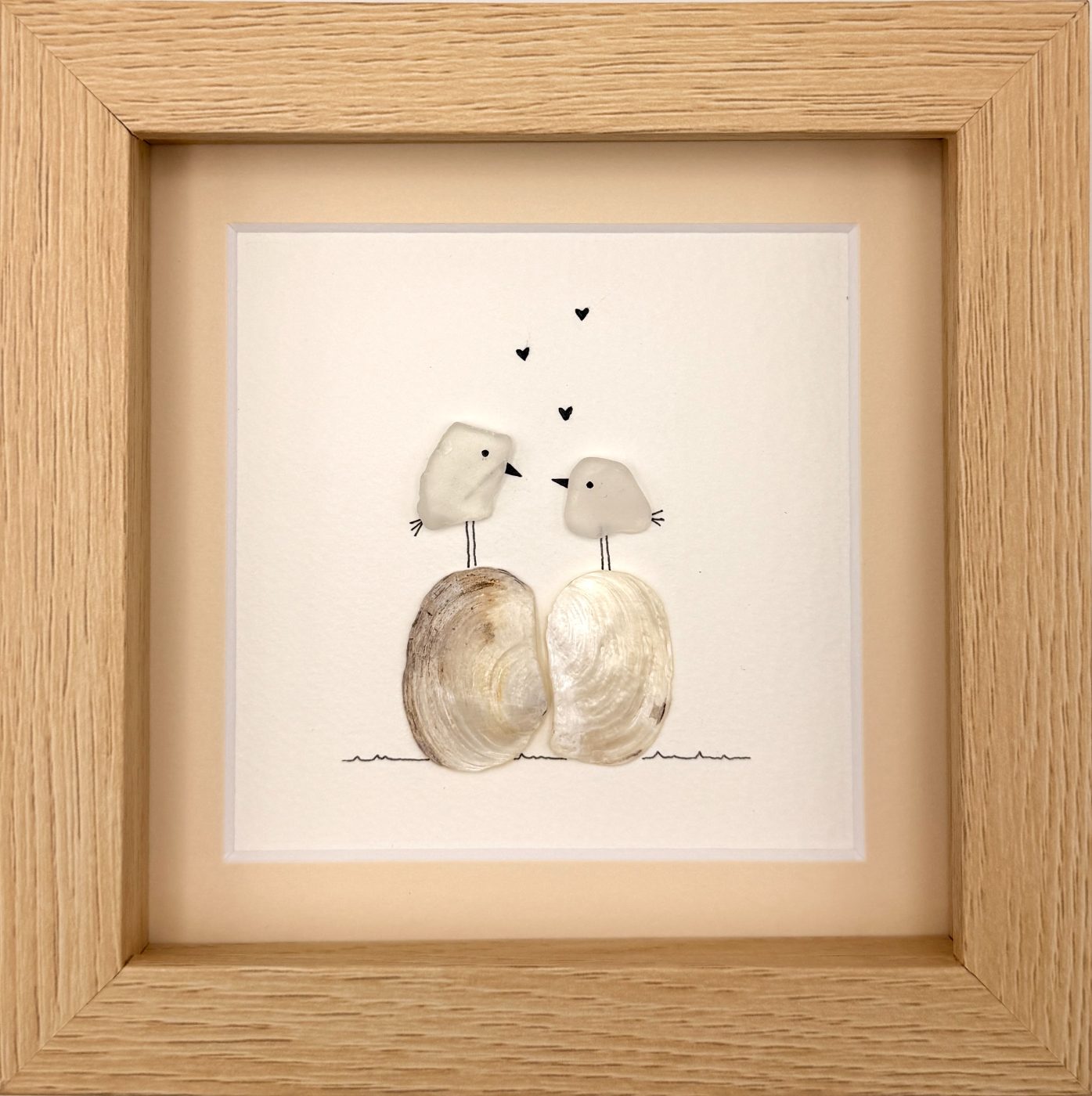 Two Love Birds on Clam Shells